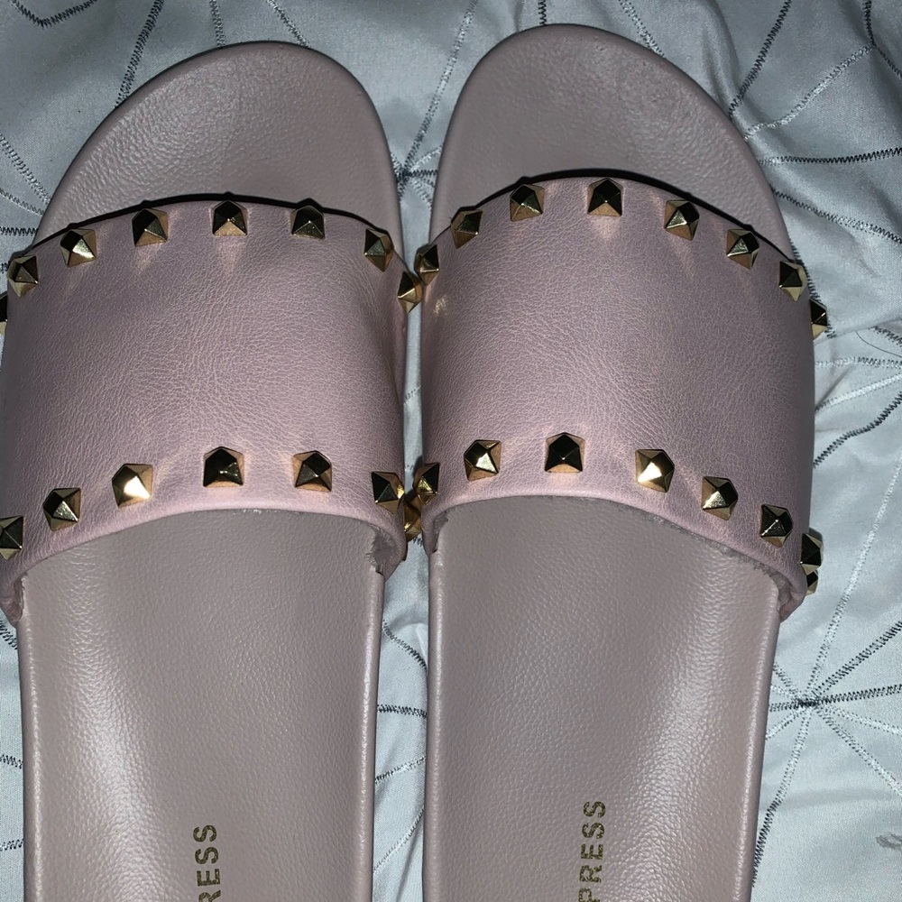 Pink studded slides